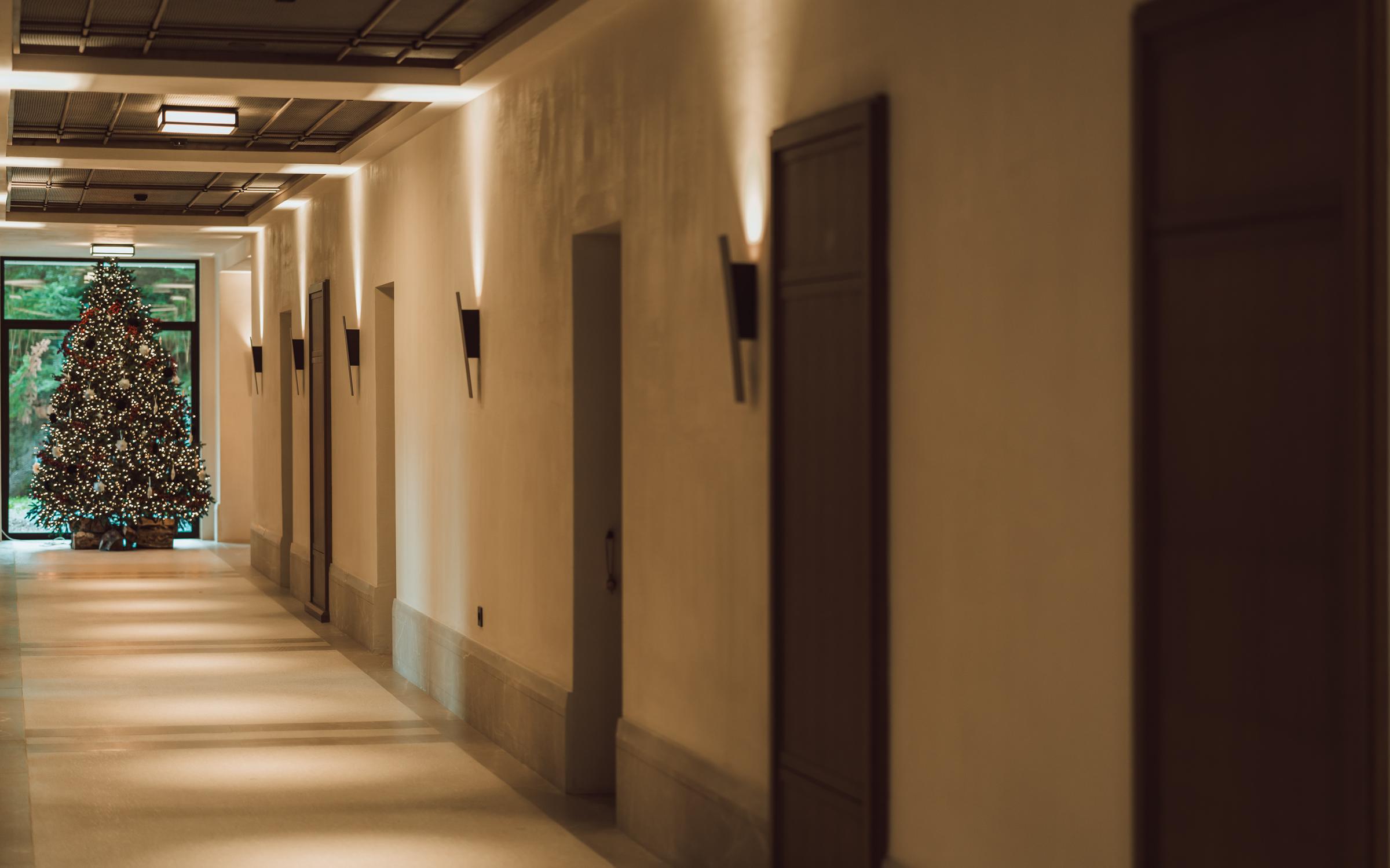 Warm, inviting lounge area at MANNA featuring cozy seating and authentic Greek design details.