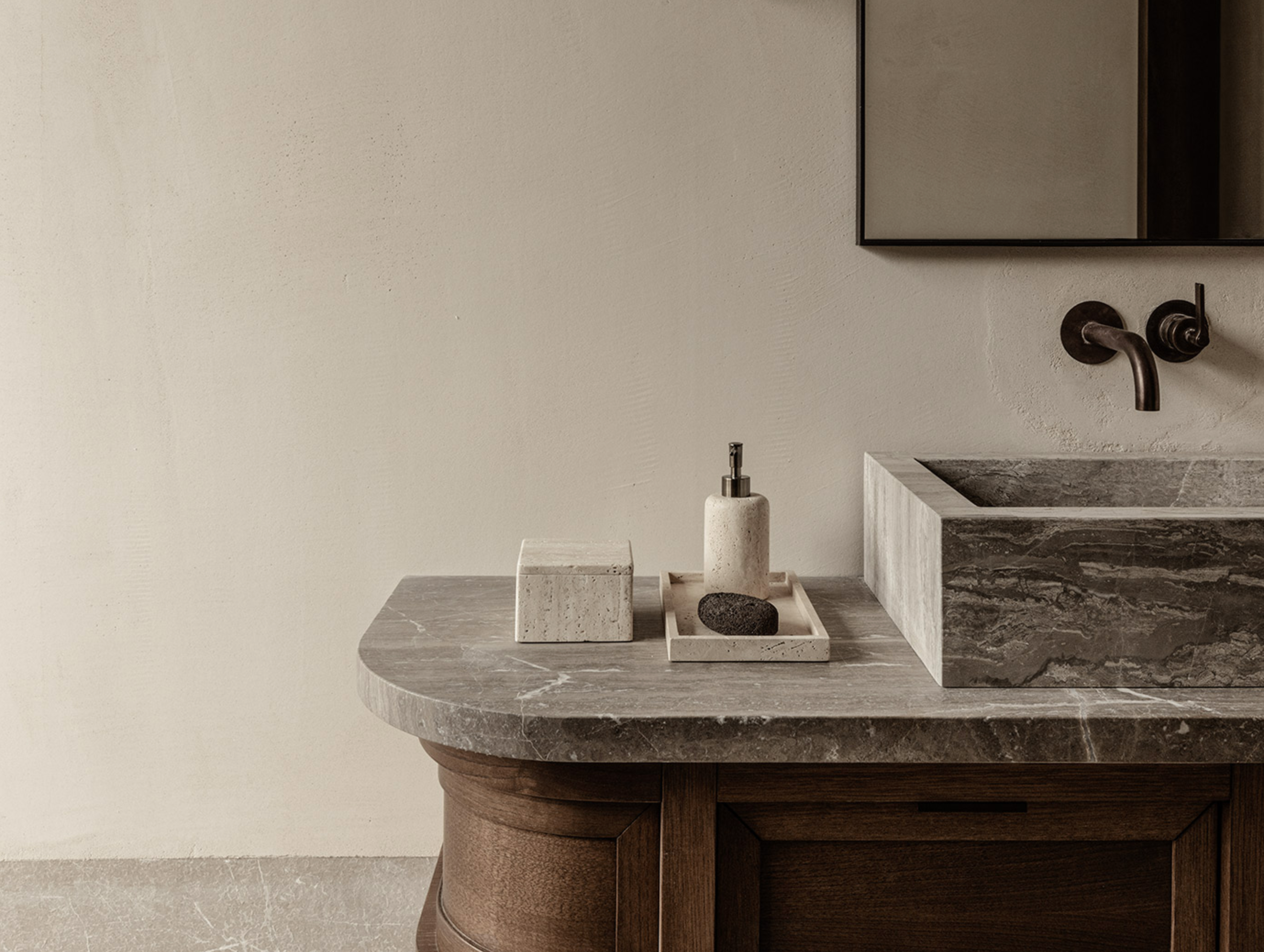 Calming interior of a MANNA room, highlighting thoughtful details, soft textures, and serene mountain surroundings.