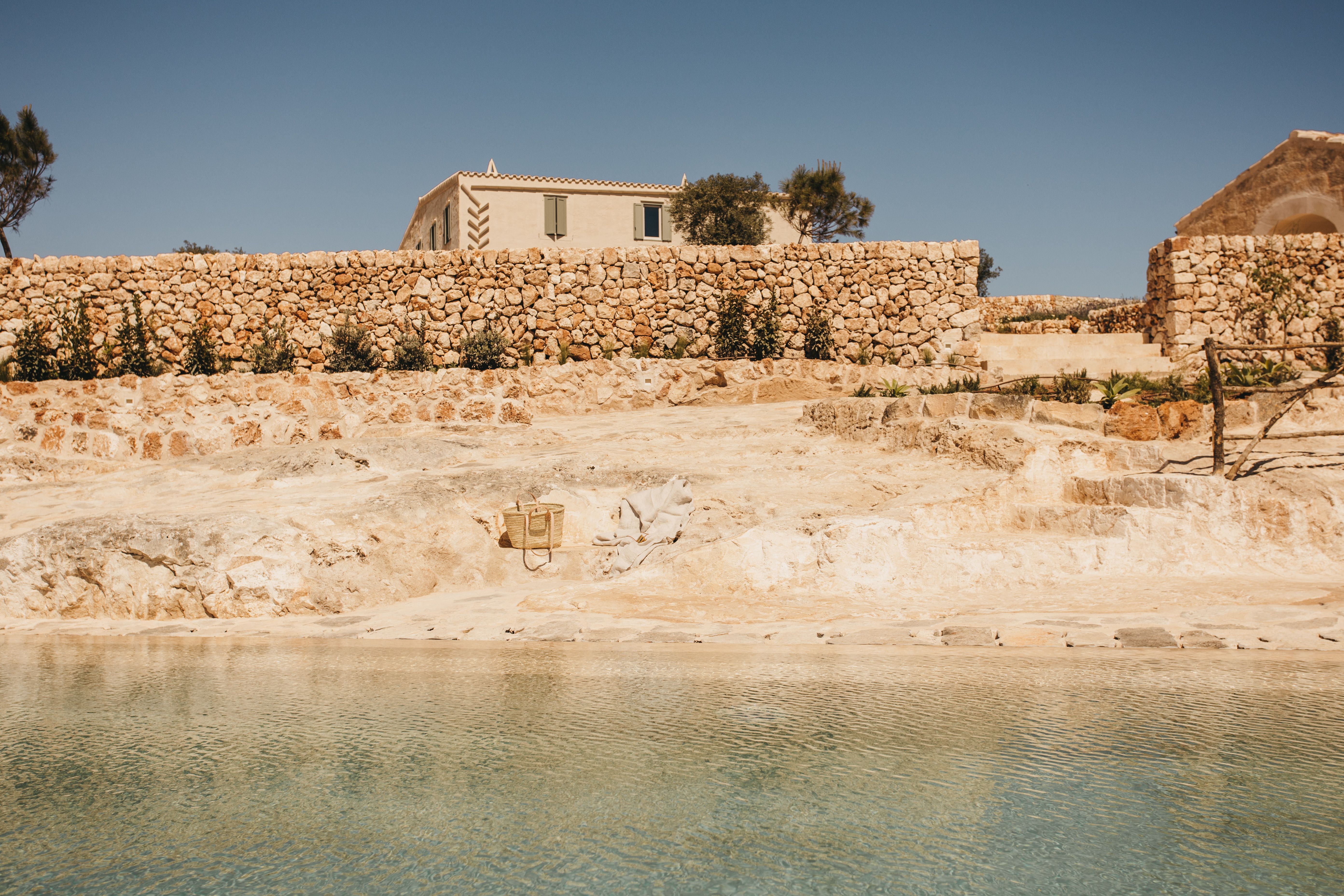 Experience mindful living surrounded by Menorca's rustic beauty at Son Blanc Farmhouse.