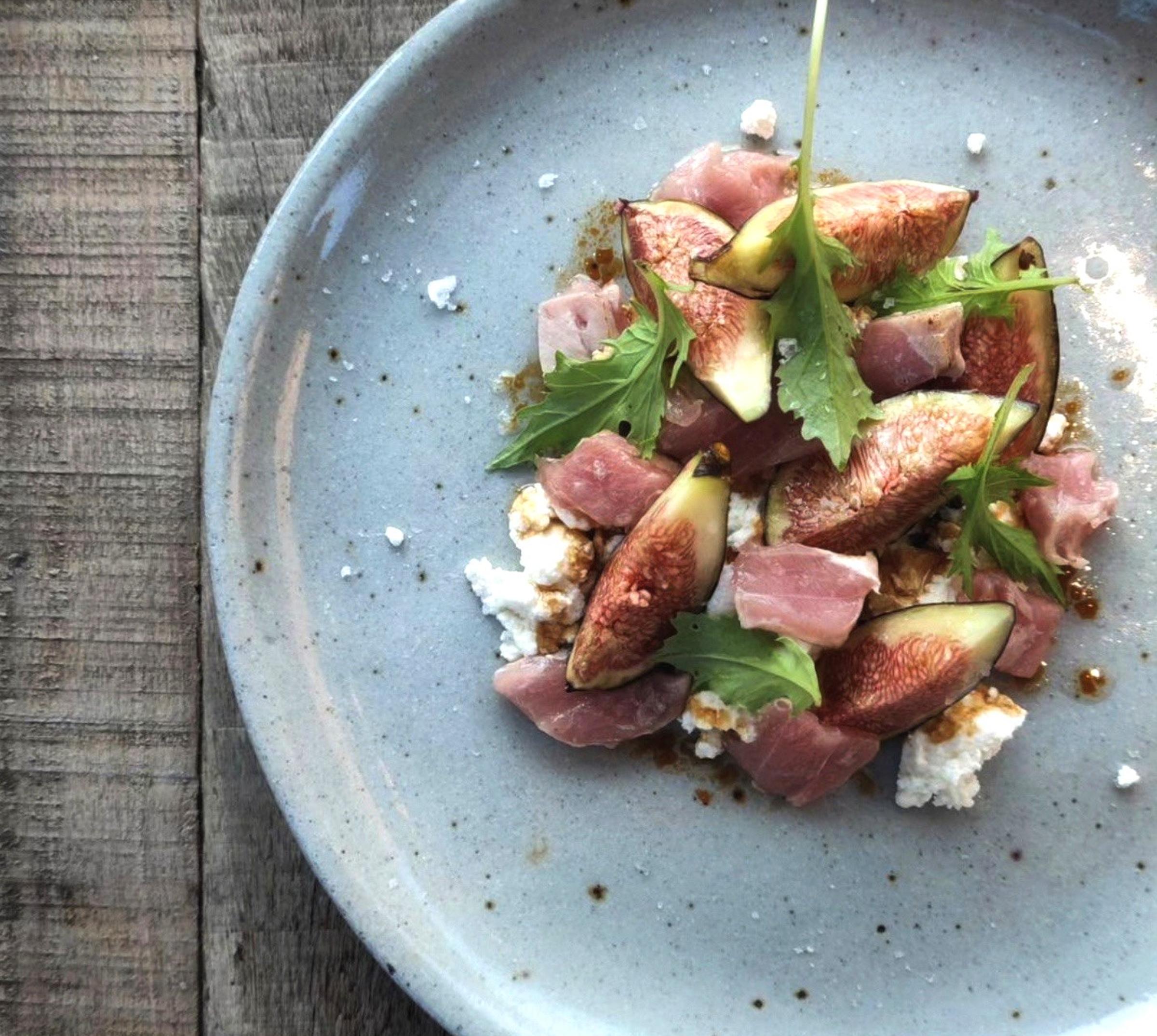 Seasonal, locally sourced dishes at Es Racó d'Artà, showcasing the flavors of Mallorca with a focus on sustainability and freshness.