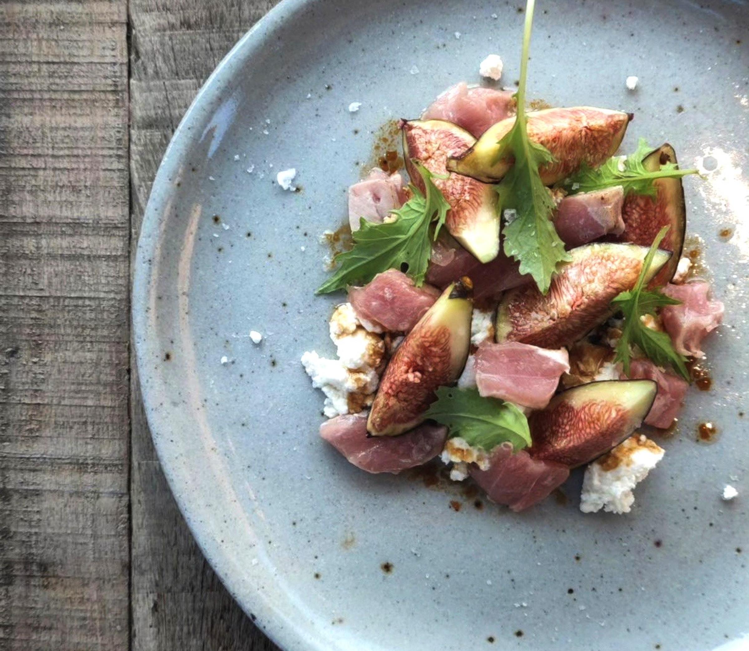 Seasonal, locally sourced dishes at Es Racó d'Artà, showcasing the flavors of Mallorca with a focus on sustainability and freshness.