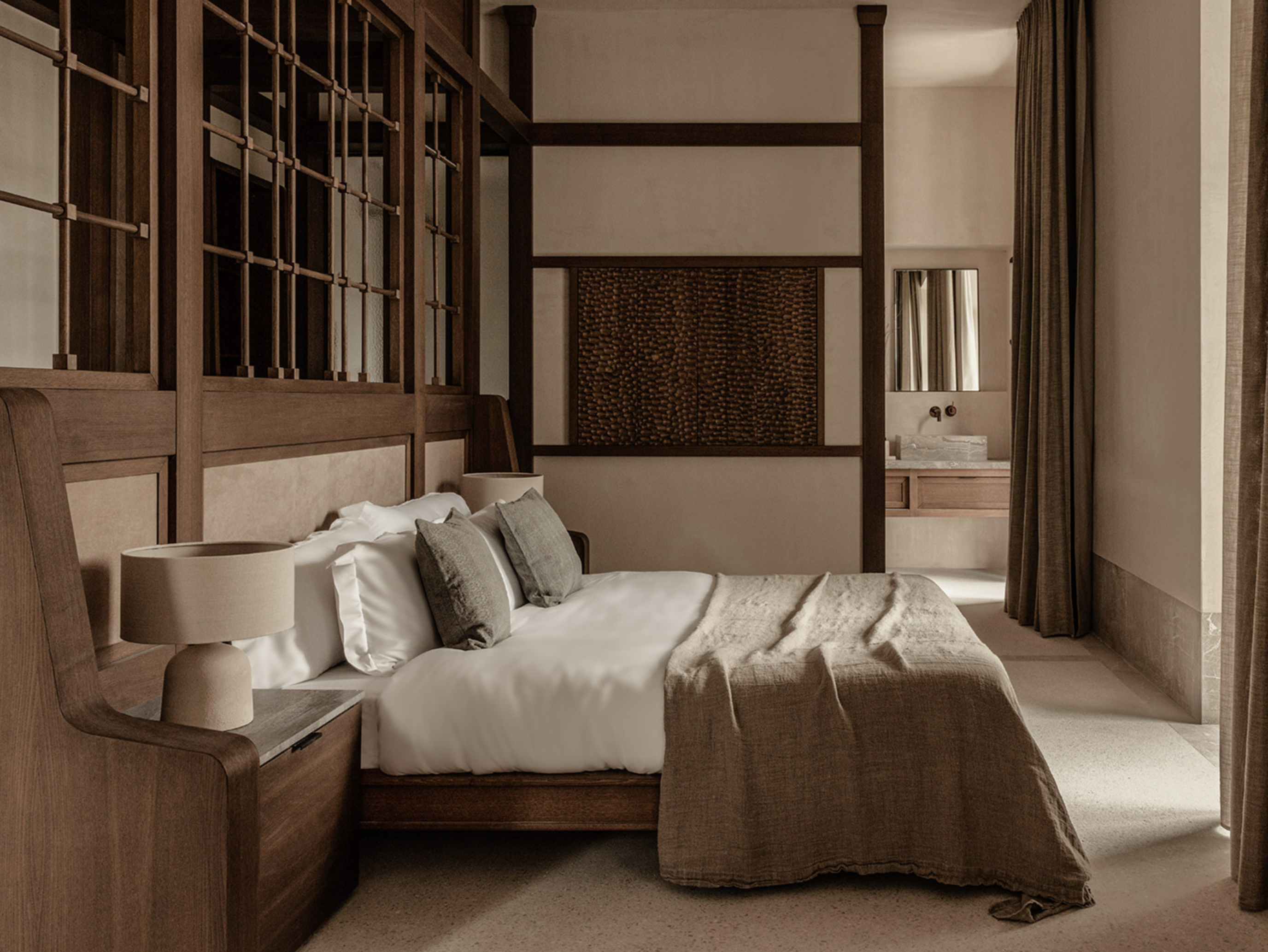 Junior Suite at MANNA, featuring luxurious décor, spacious interiors, and serene forest views ideal for relaxation.