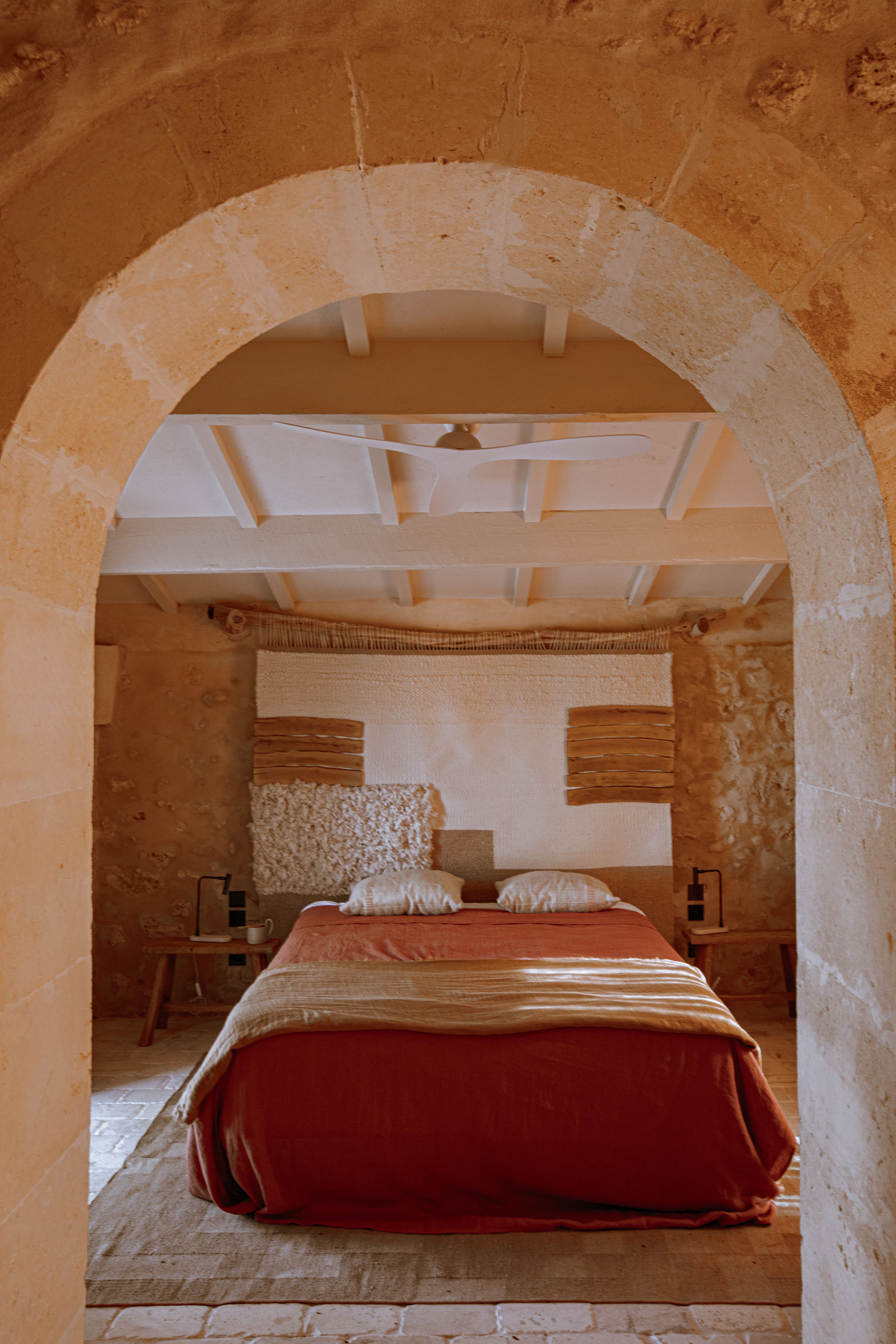 Elegant, airy room at Son Blanc featuring minimalist decor, soft natural tones, and serene views that evoke pure relaxation.