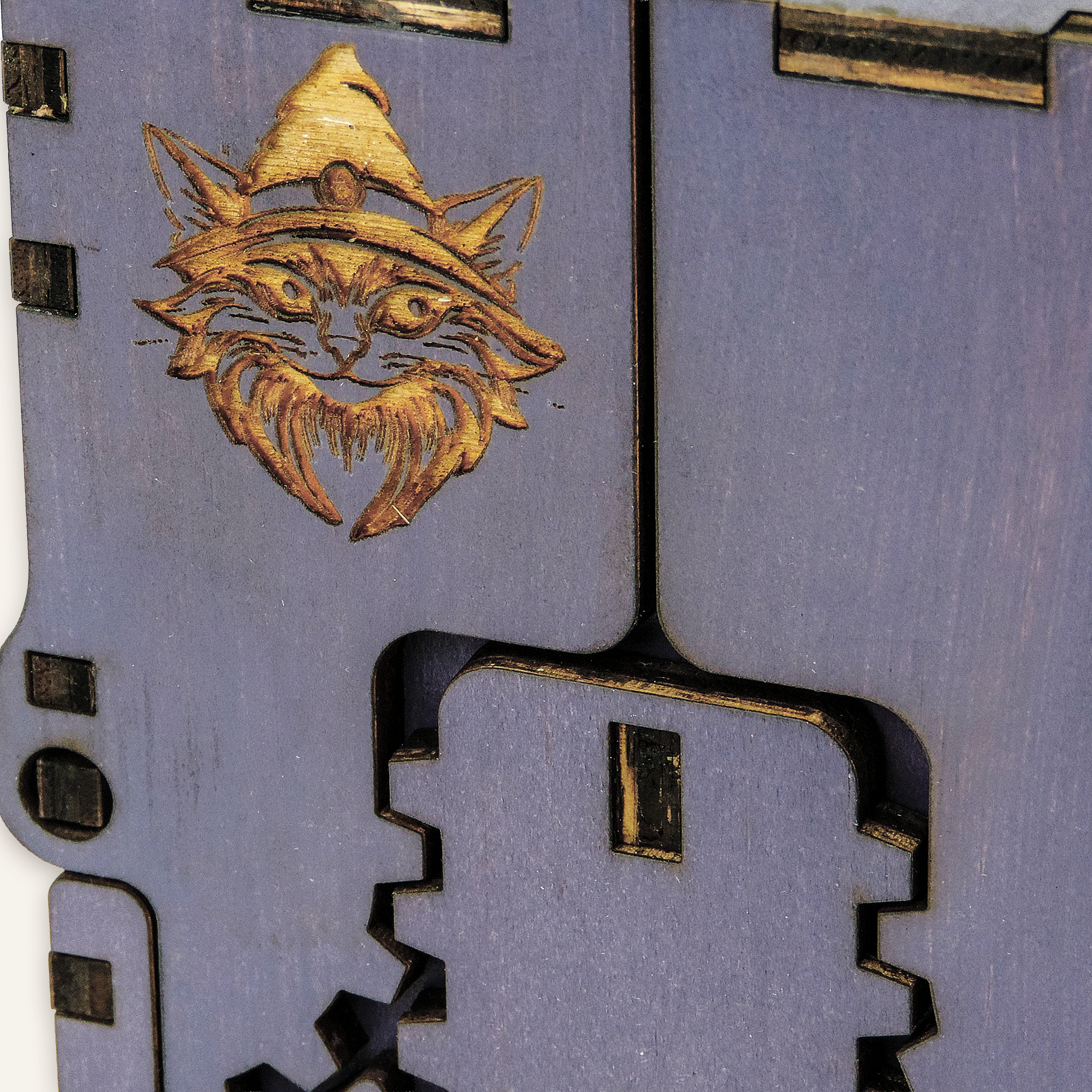 Laser-cut wizard box, purple-painted birch plywood