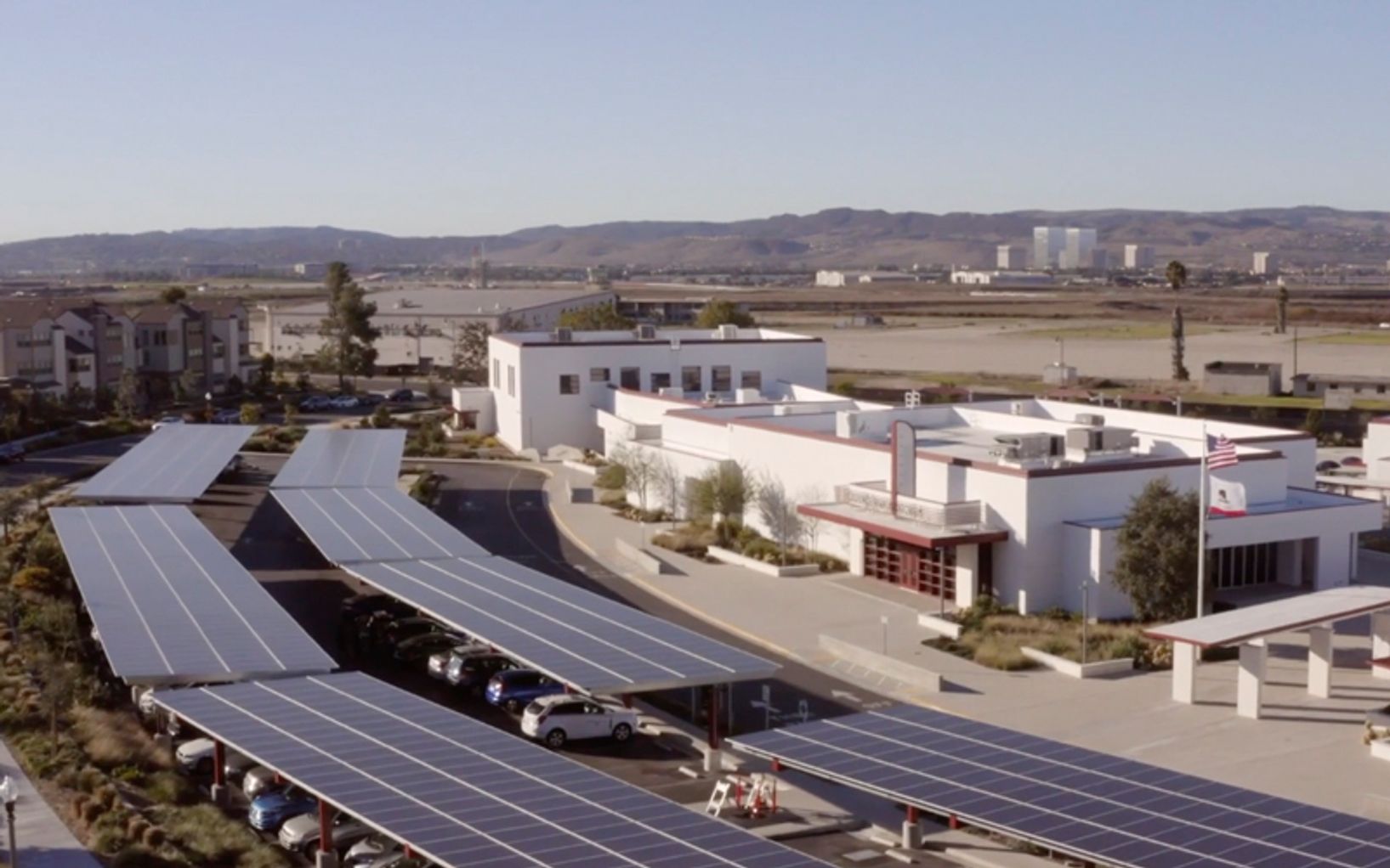Carport mounted solar panels at a school parking lot - Onyx Renewables