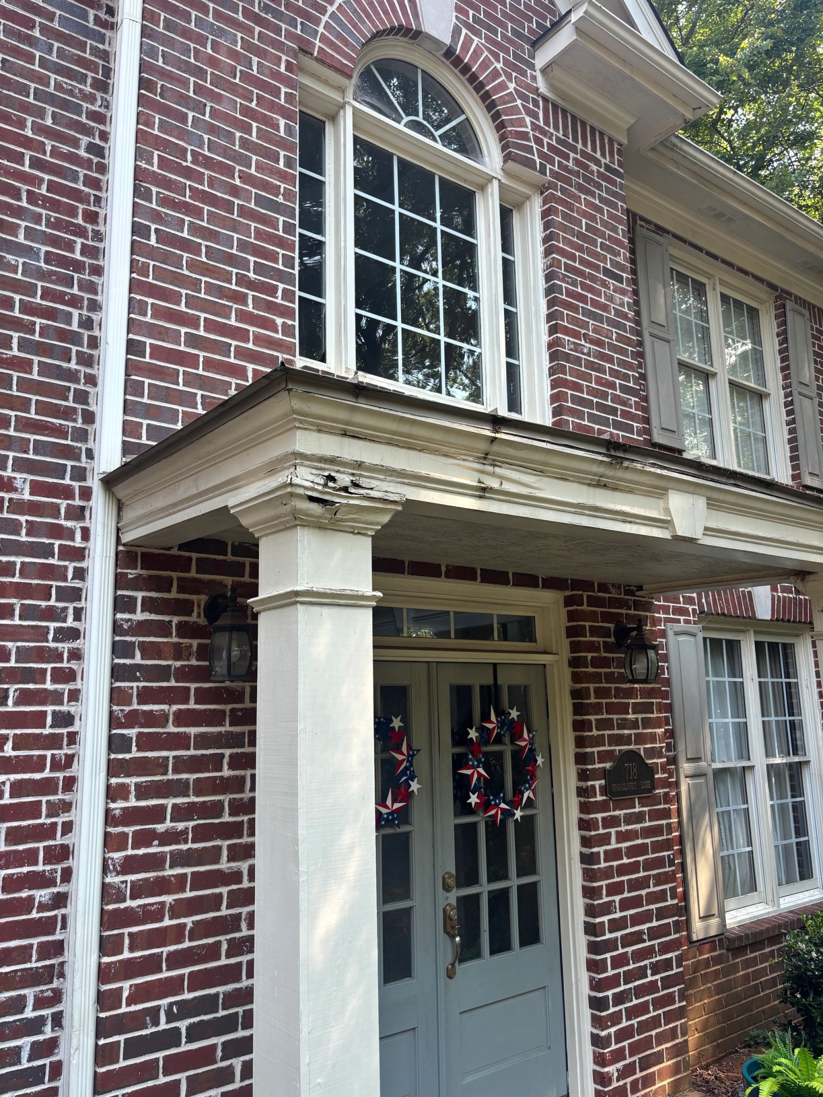Rotten wood on front awning before repair