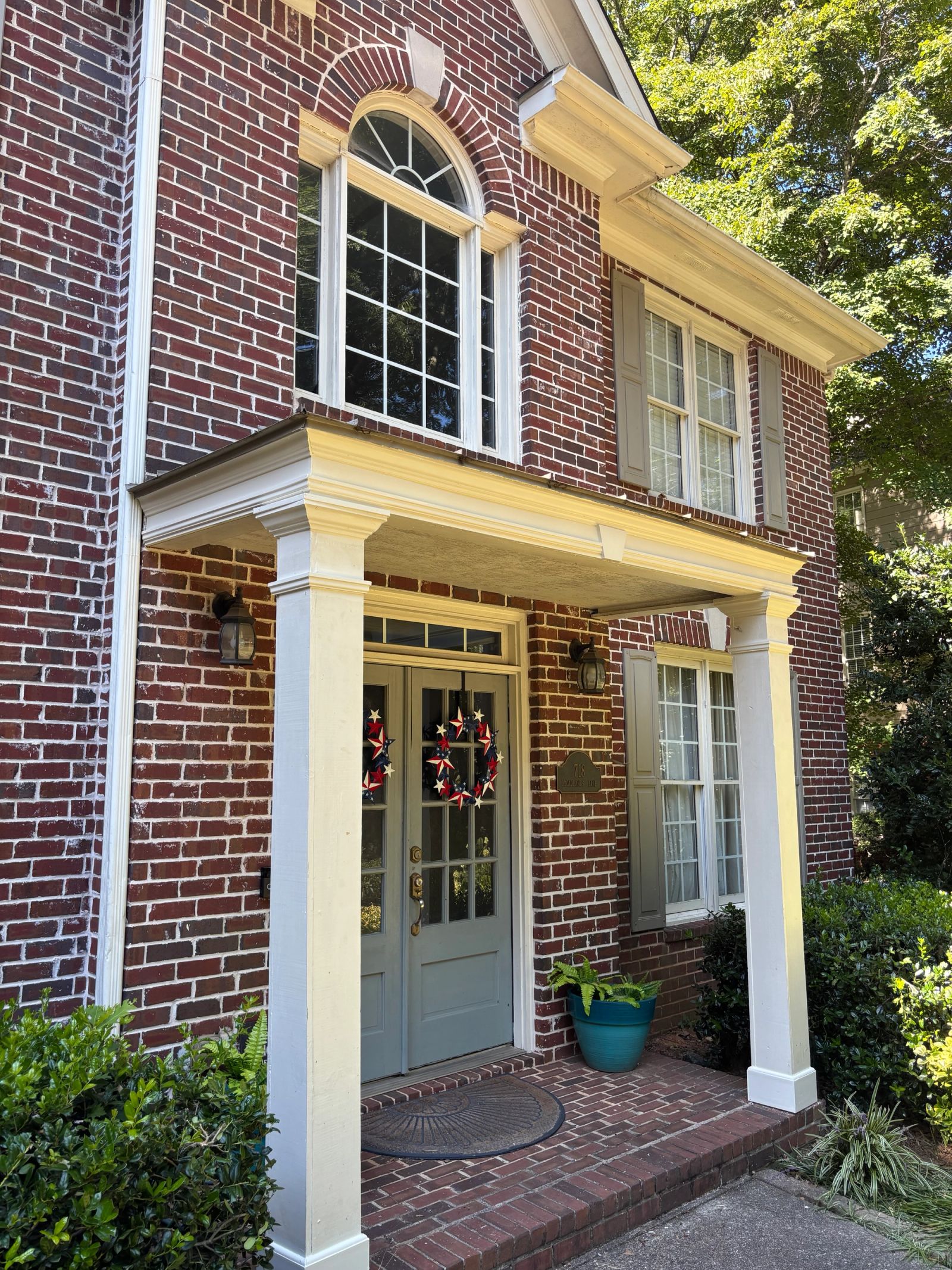 New PVC crown molding, fascia, trim, and center block—all sealed and painted to match the existing columns.