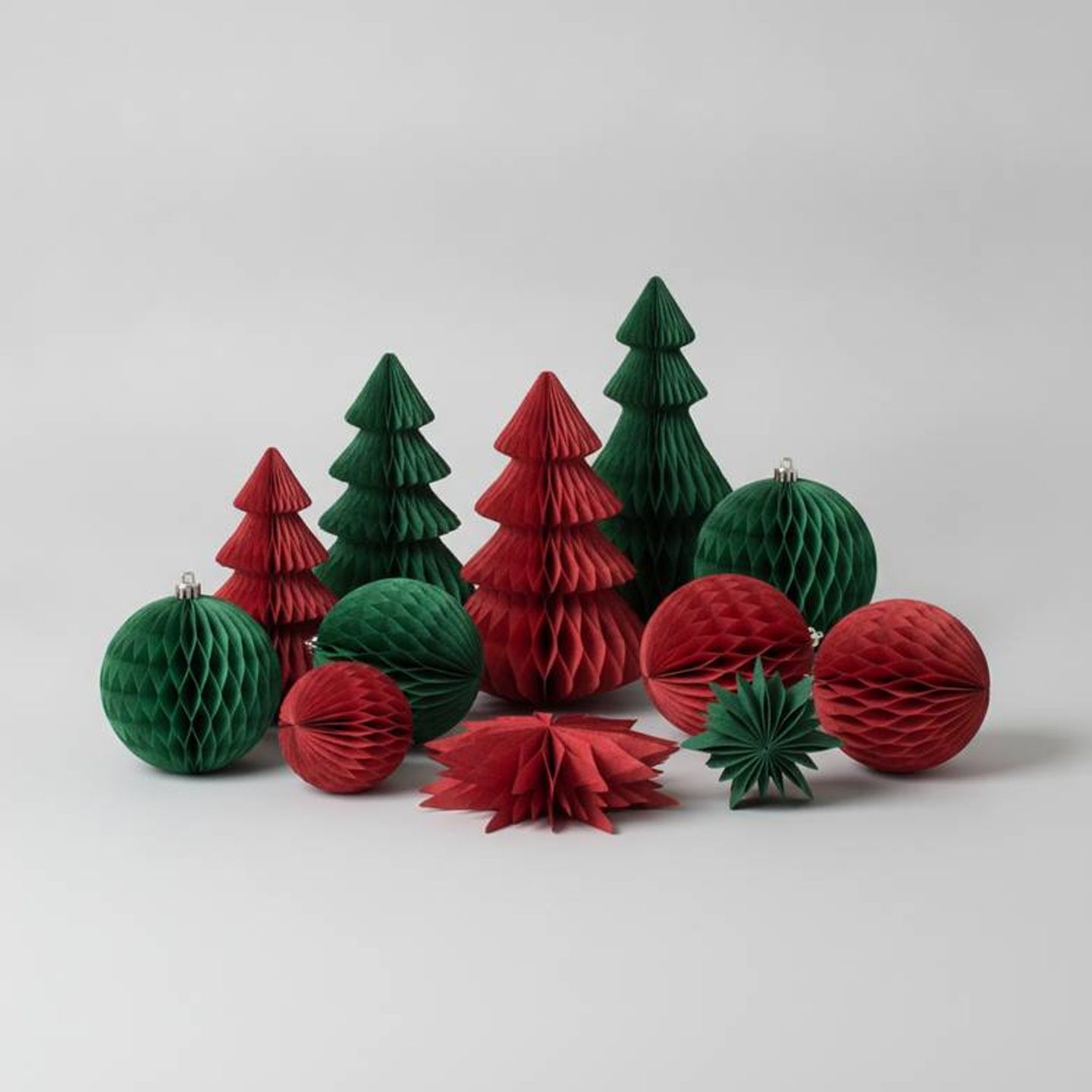 A display of seasonal paper decorations with consistent colors, demonstrating successful paper decoration color matching