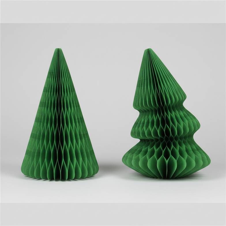 A side-by-side comparison of two honeycomb paper decorations, one holding its shape and one slightly sagging