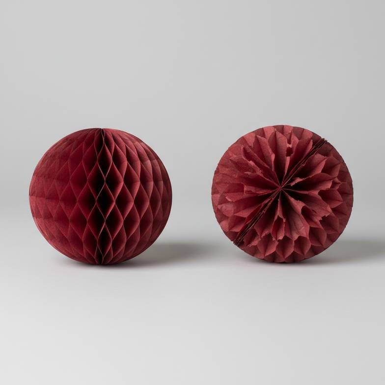 Close-up of a high-quality honeycomb paper structure next to a flimsy, poorly made one