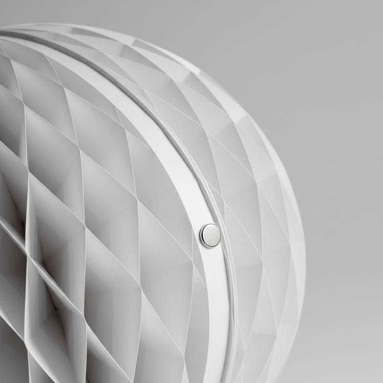 A detailed view of the honeycomb structure and paper texture of a custom paper decoration.