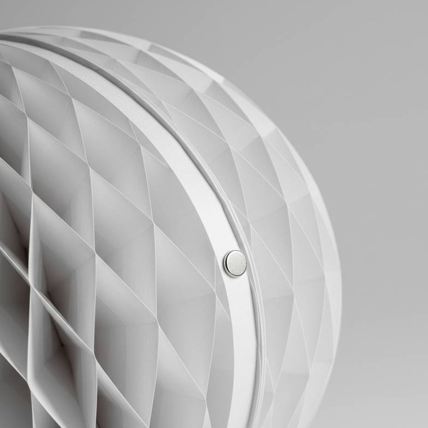 A detailed view of the honeycomb structure and paper texture of a custom paper decoration.