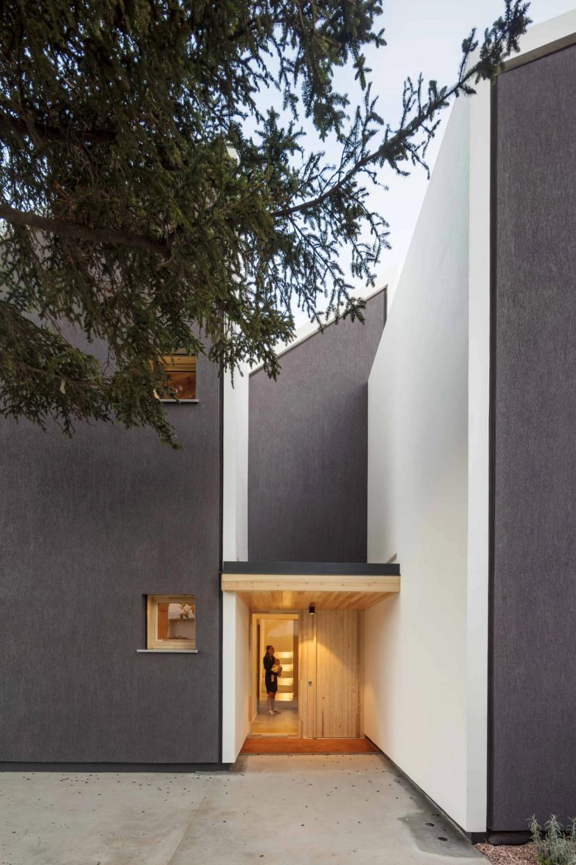 Inner façade of Casa NOA in Catalonia with gallery overlooking the garden and pool
