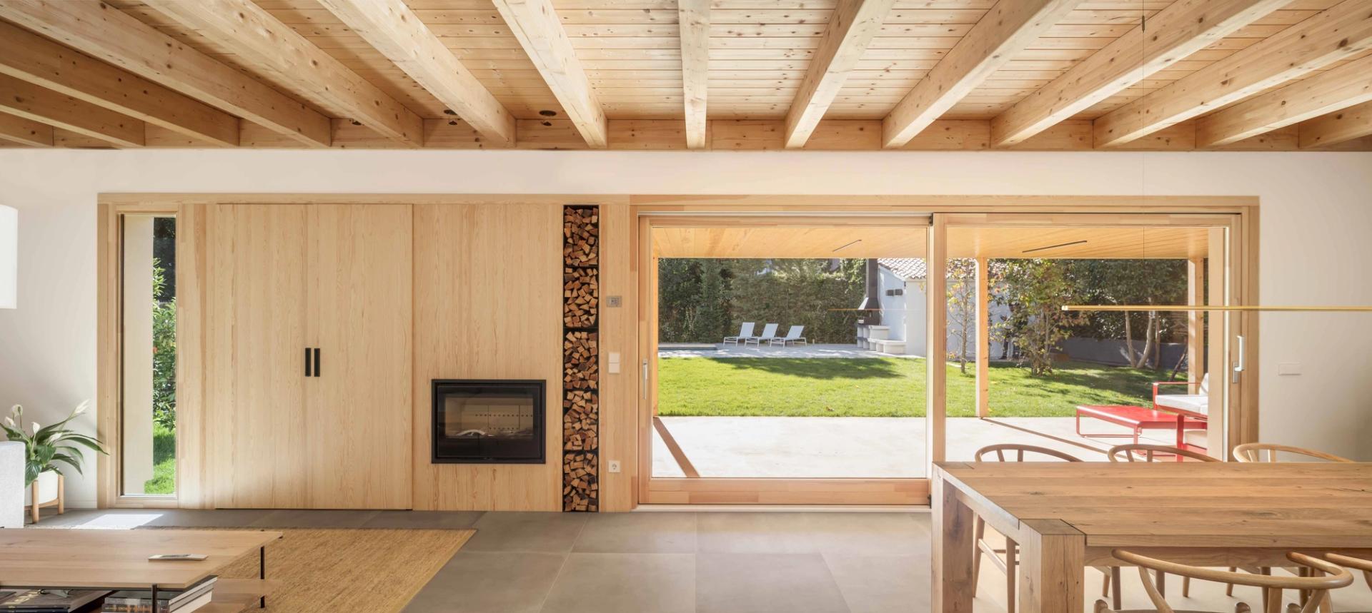 Inner façade of Casa NOA in Catalonia with gallery overlooking the garden and pool