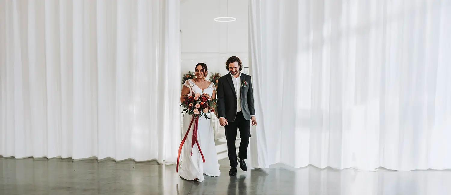 Couple walking into a room
