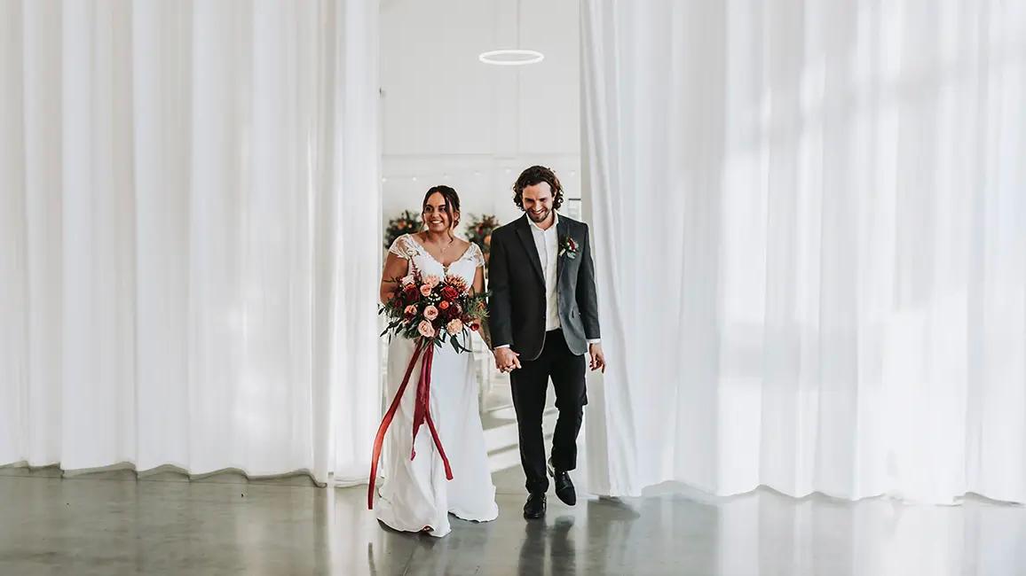 Couple walking into a room