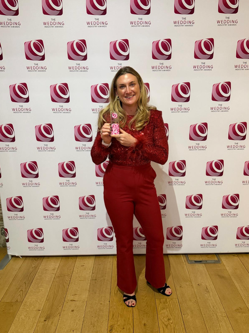 Wenna Hicks collecting an award