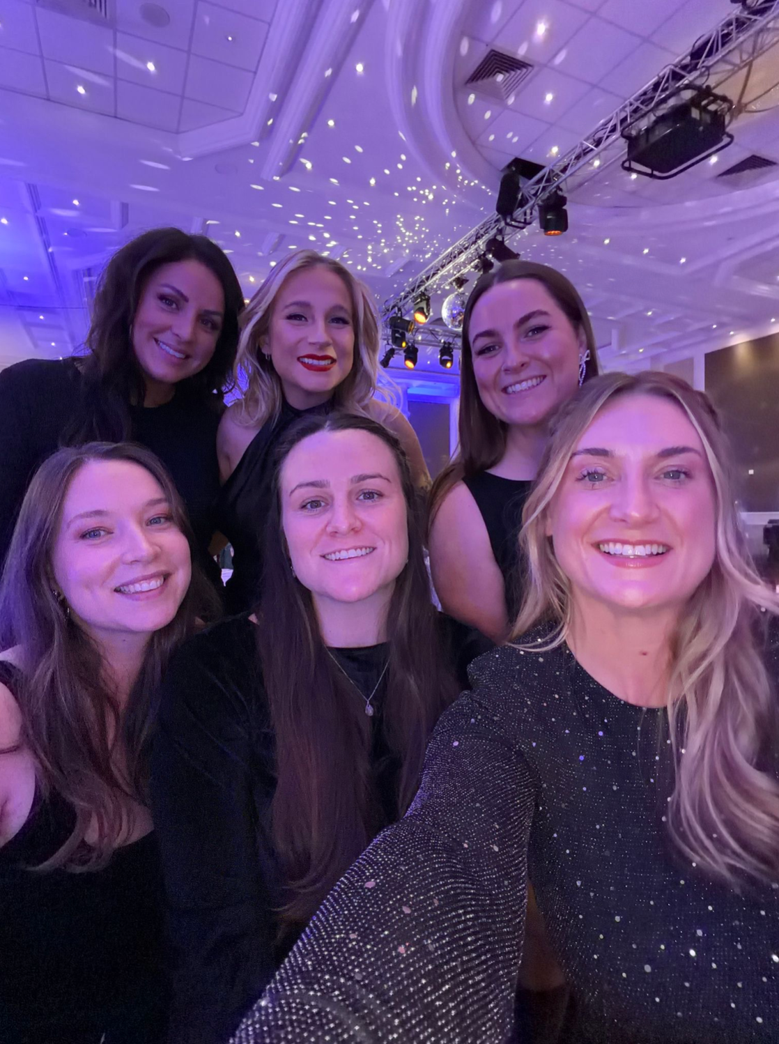 The wedding team at an awards event