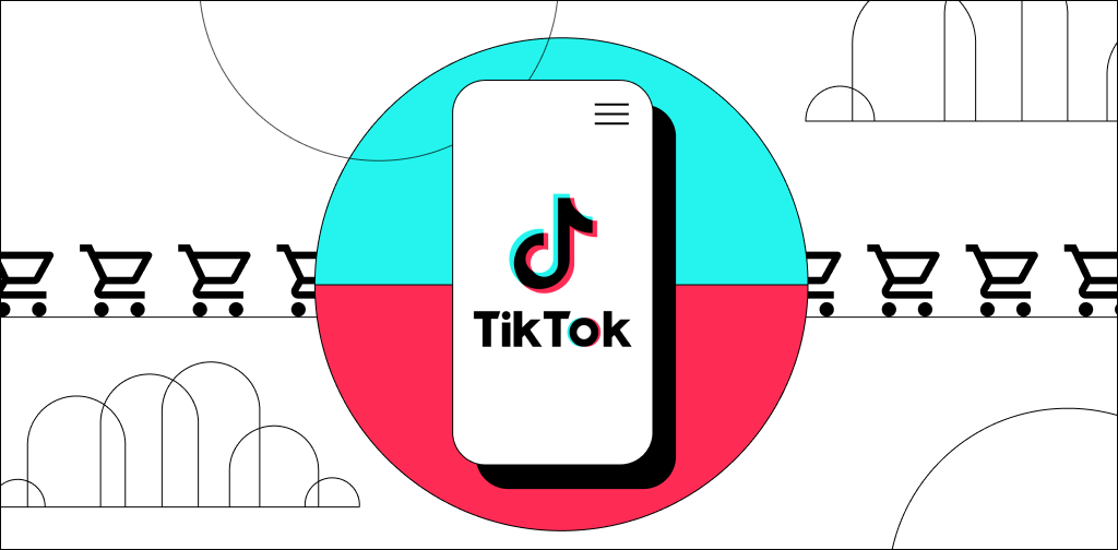 TikTok logo on a mobile phone with shopping carts in the background