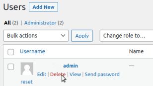 Find the old admin username and click the red Delete link.