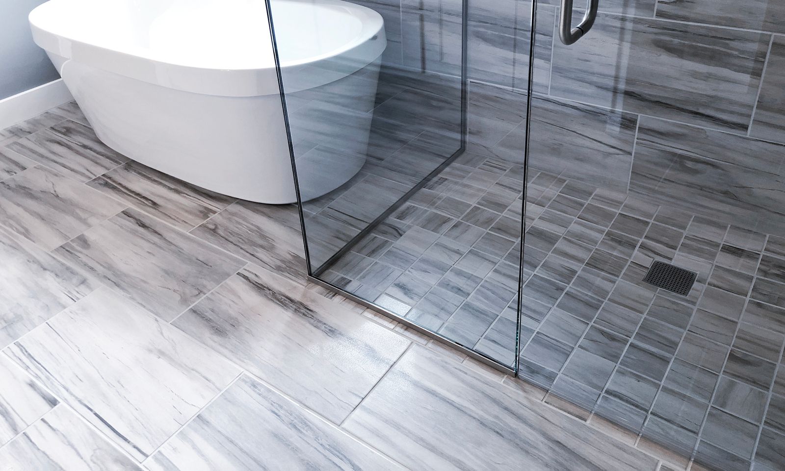 Modern tile flooring installed in a bathroom with clean lines and contemporary styling.