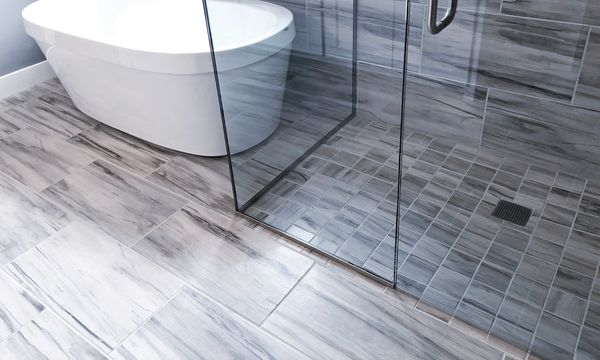 Modern tile flooring installed in a bathroom with clean lines and contemporary styling.