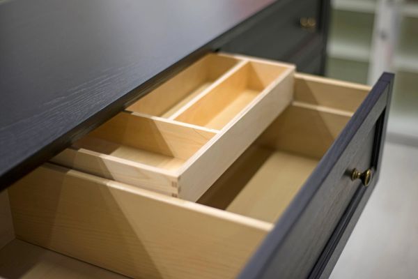 Floor model dresser drawer with built-in storage compartments and wood organizers