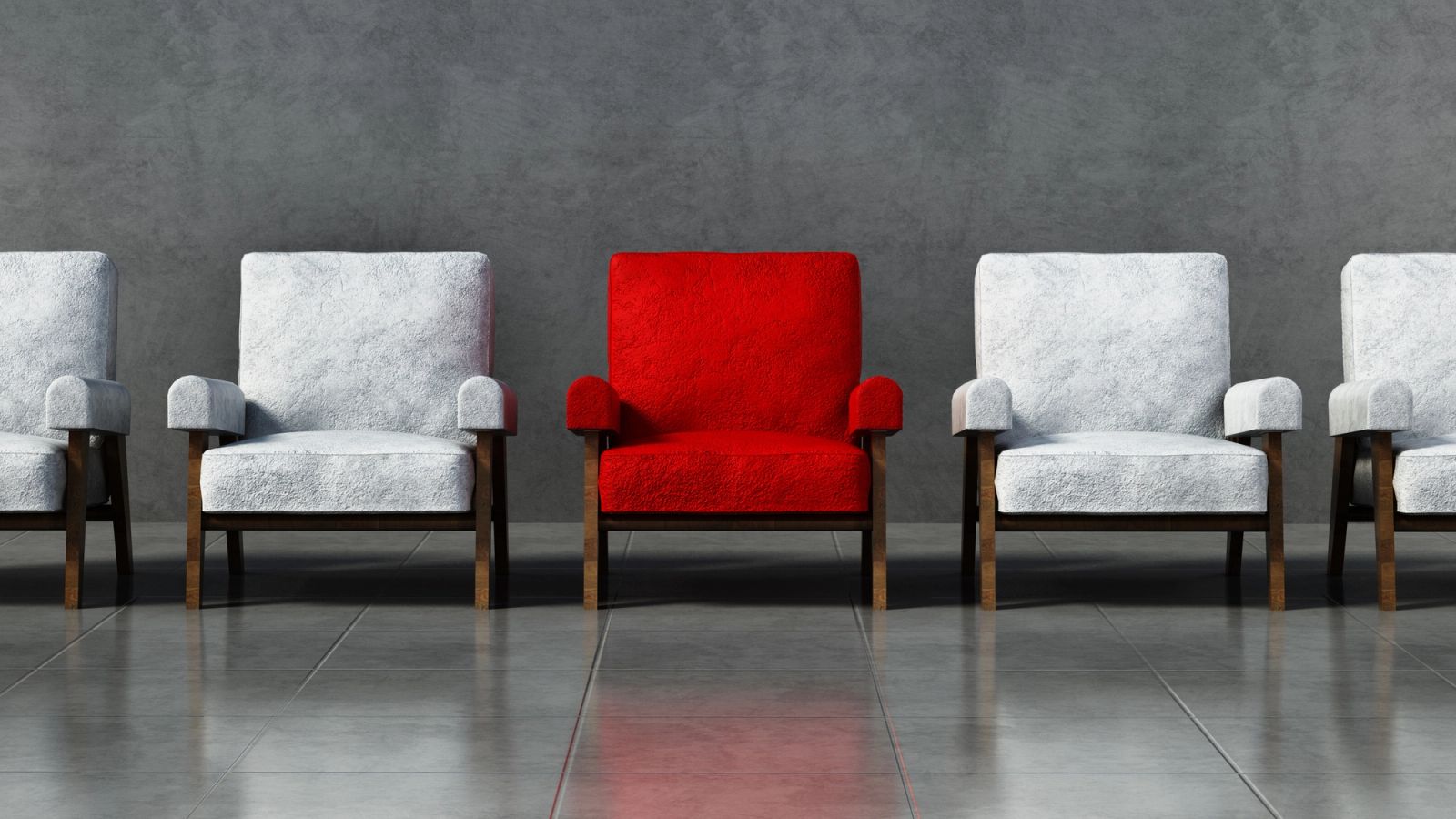 A red chair standing out among neutral chairs, representing a misfit furniture piece separated from its original set.