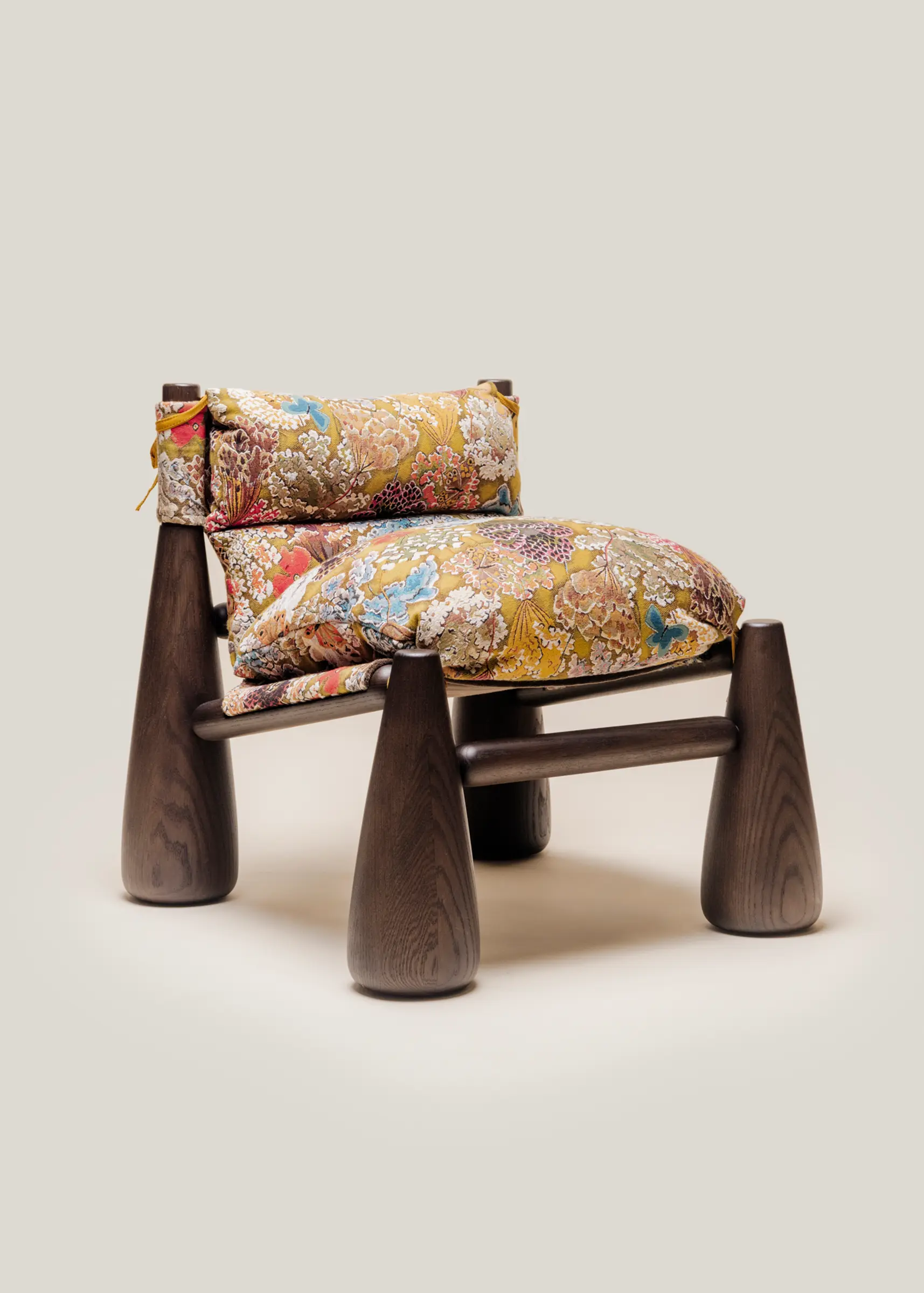 Bell Chair with a walnut finish and tapestry fabric