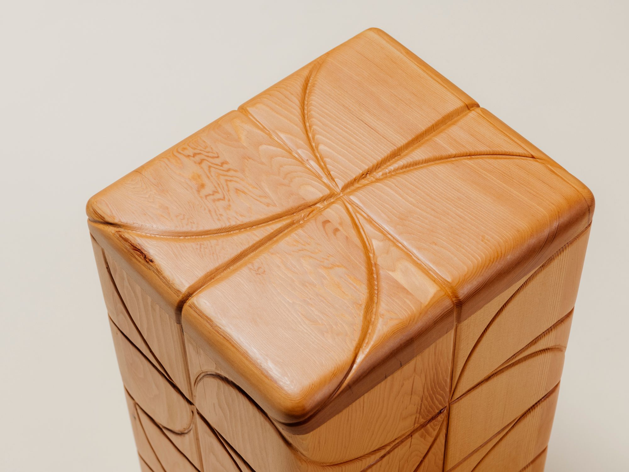 detail of top of wood table with pinwheel design