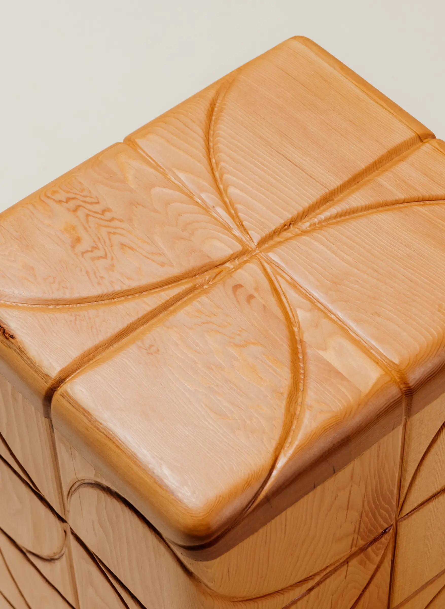 detail of top of wood table with pinwheel design