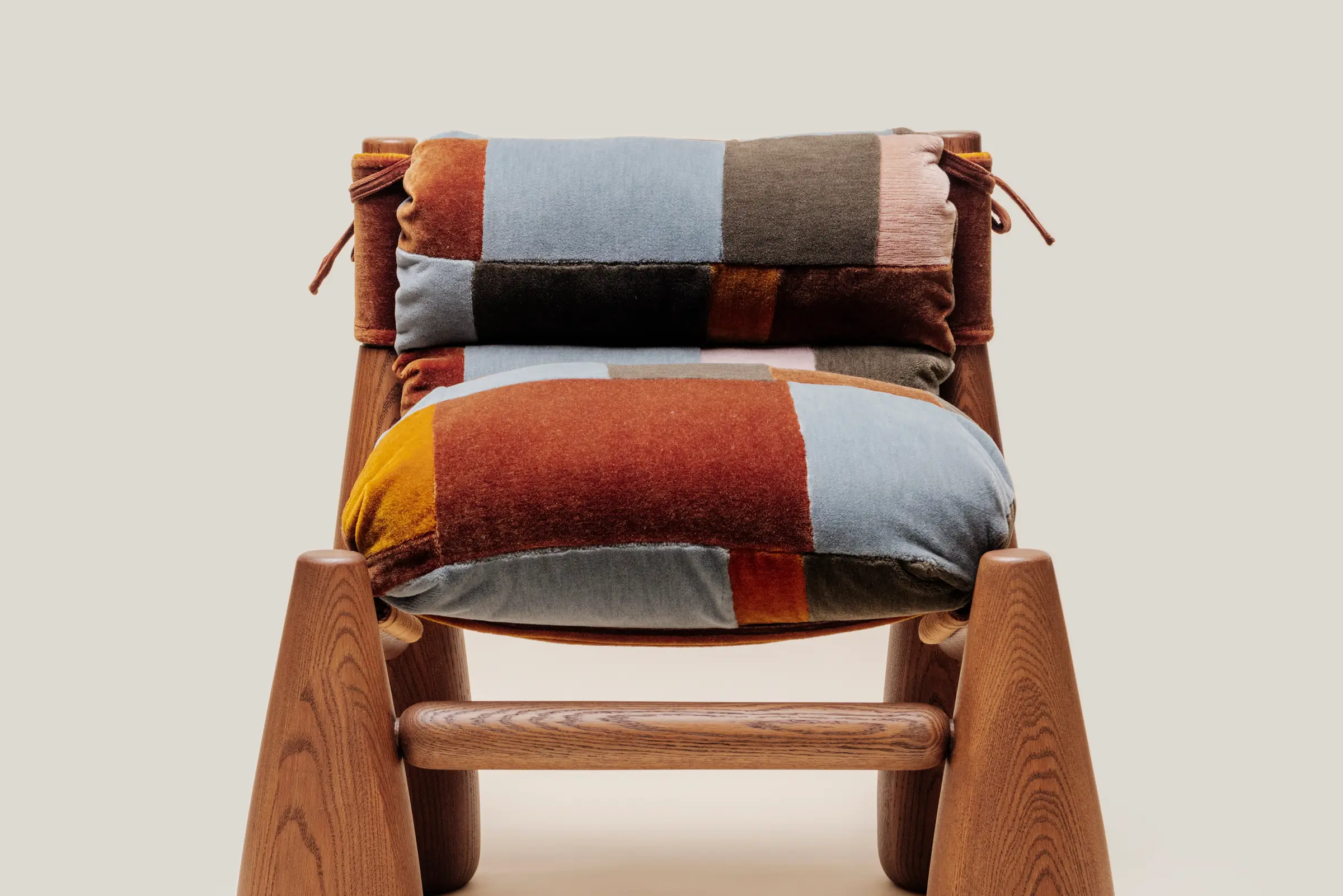 Close up of the heirloom bell chair patchwork fabric details.