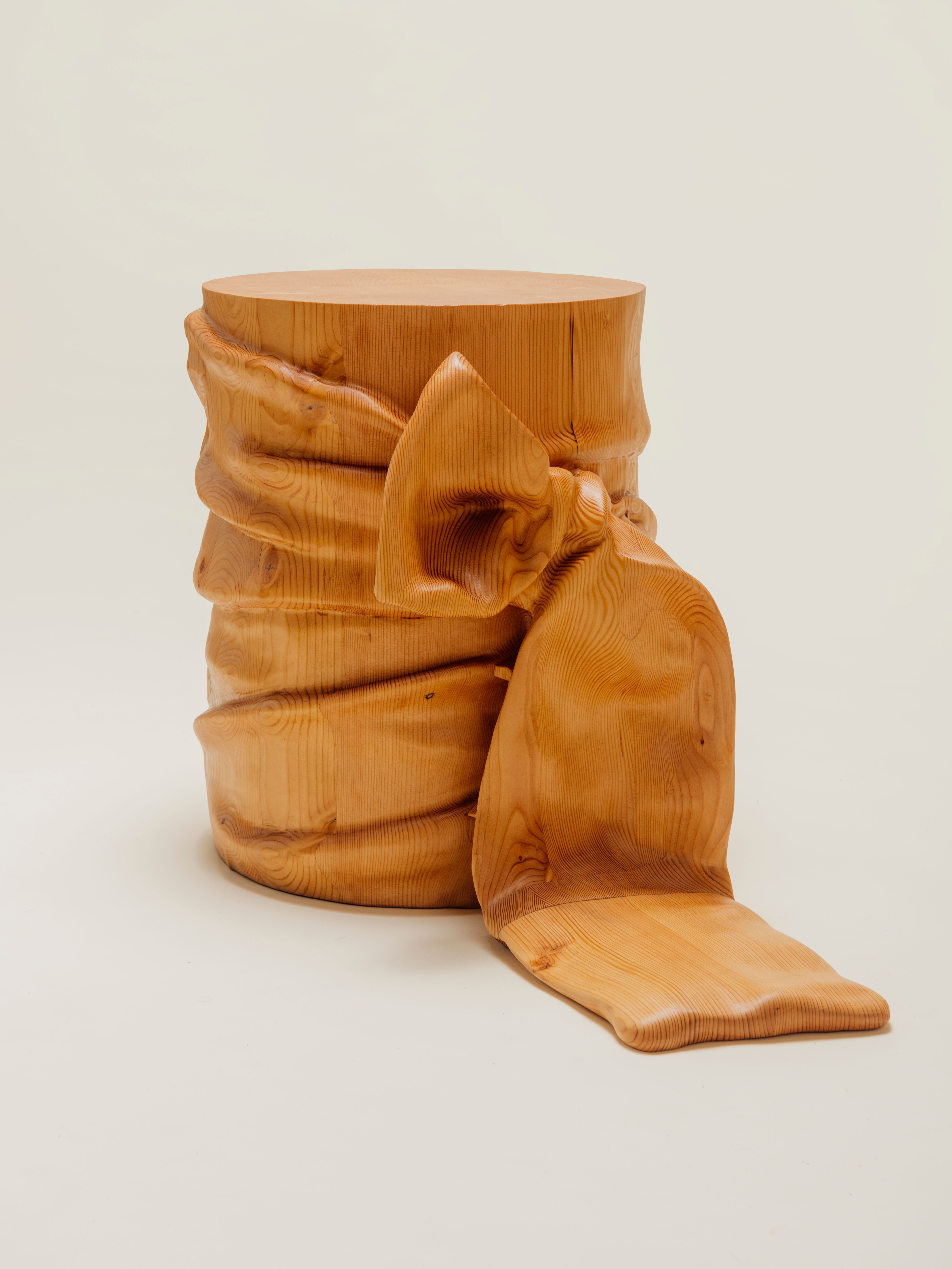 Wooden table with bow carved out 