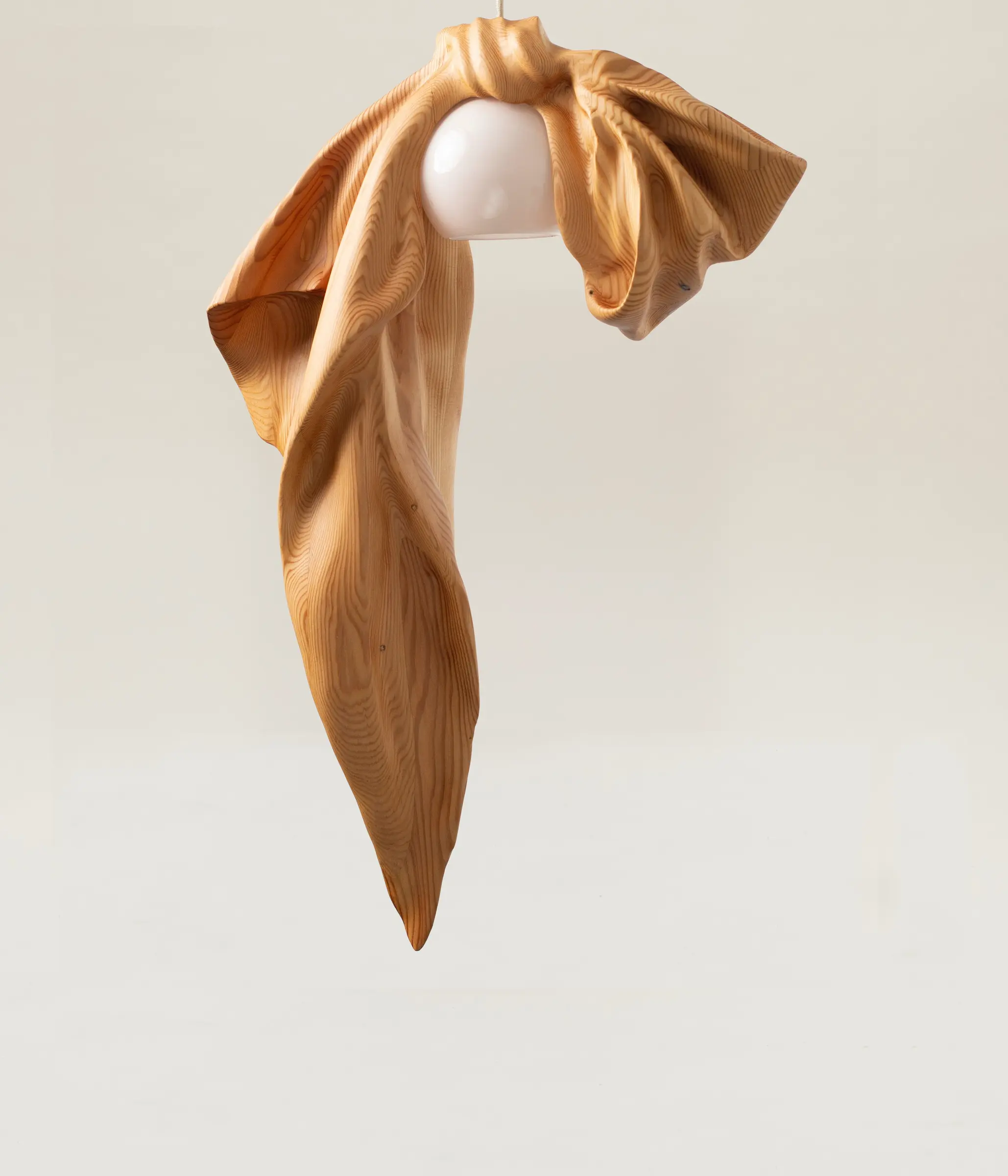 Light fixture that looks like a ribbon tied into a bow