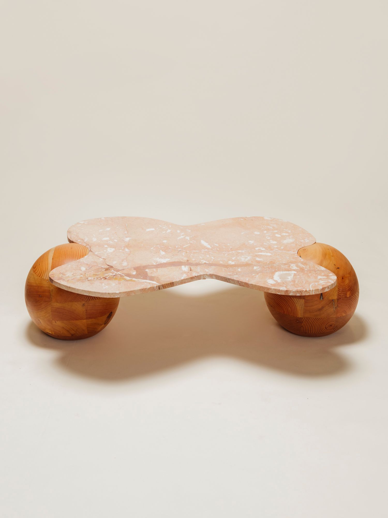 wood sphere leg table with pink marble top