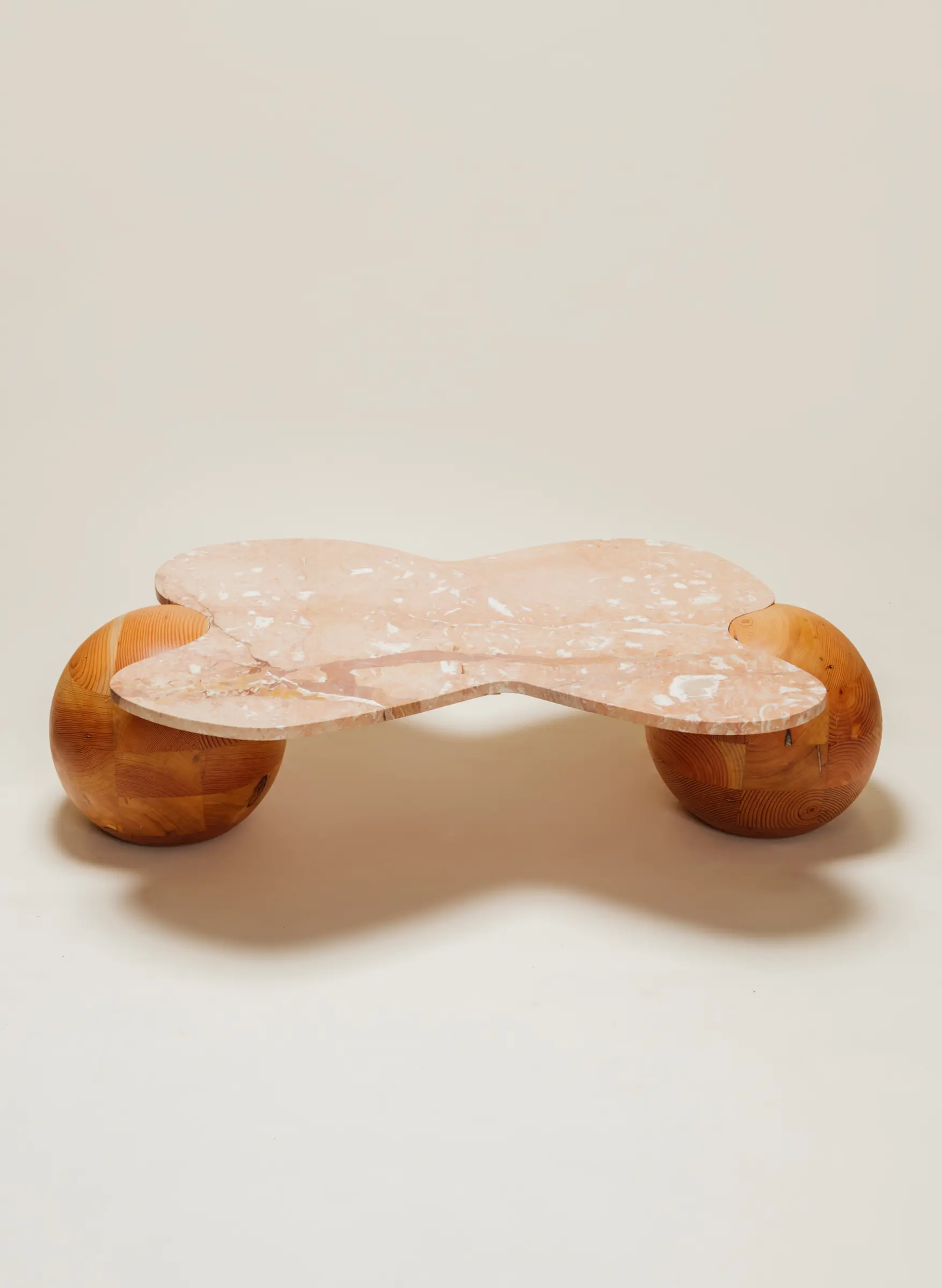 wood sphere leg table with pink marble top