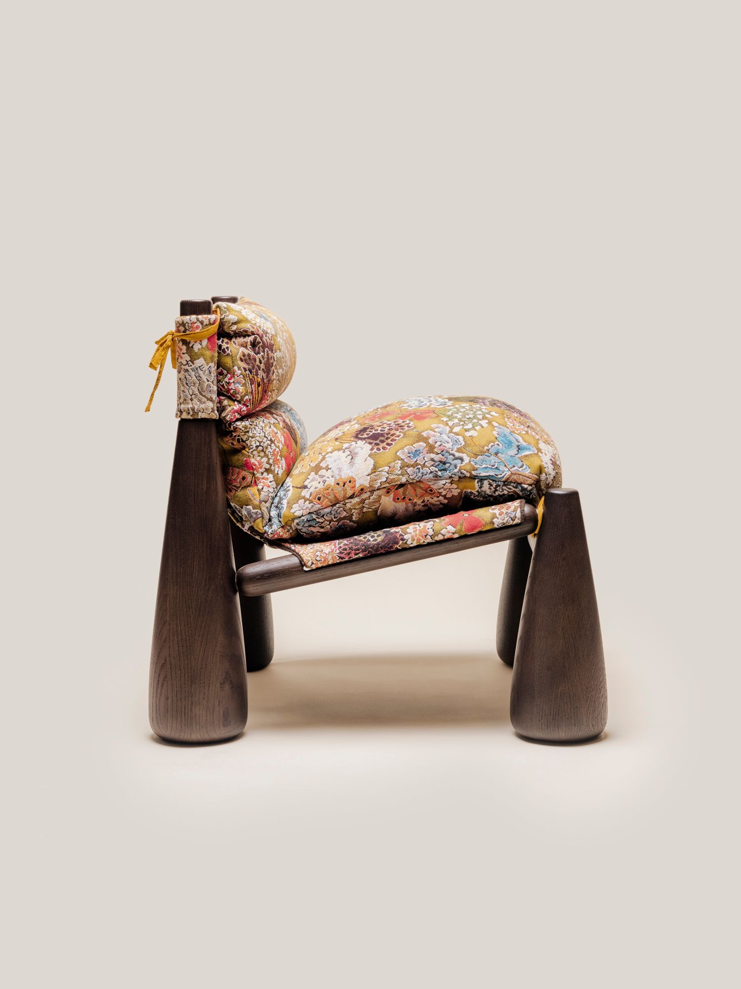 Profile view of Bell Chair in french tapestry fabric