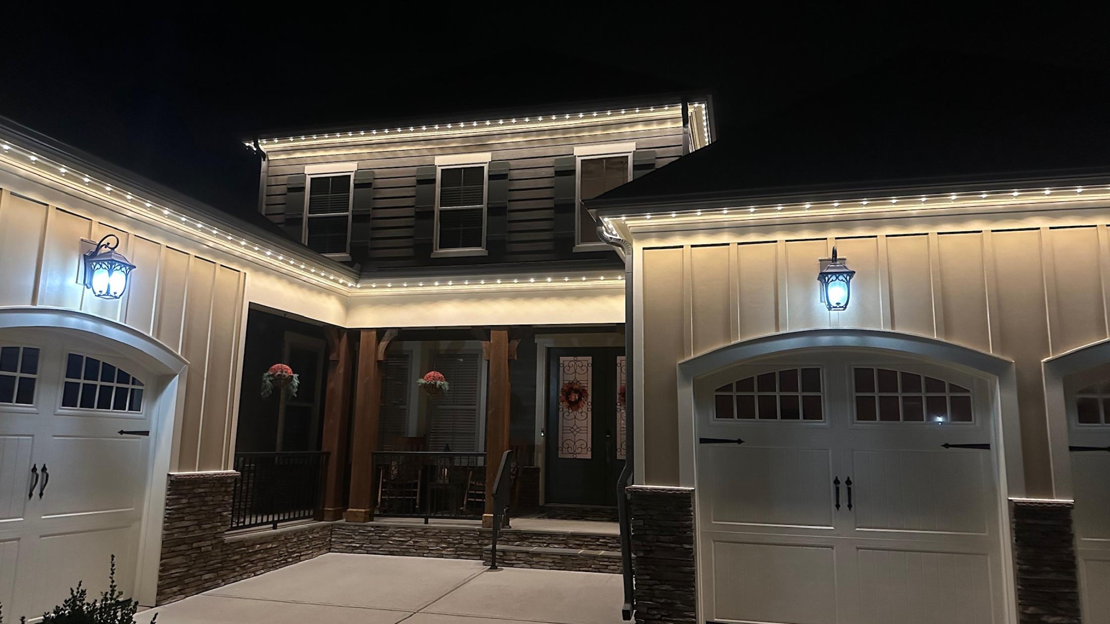 Architectural lighting highlighting stone and siding textures