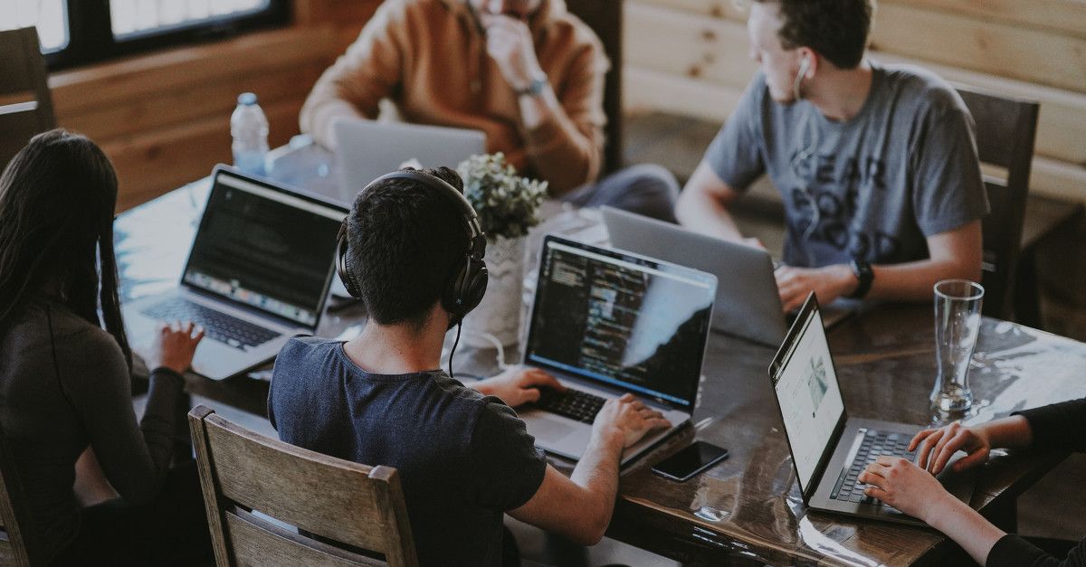 Working professionals sitting at desk