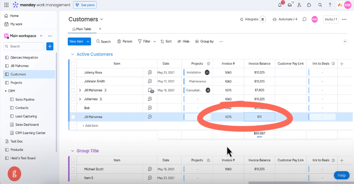 Product shot of Glances user checking invoice balance in monday.com