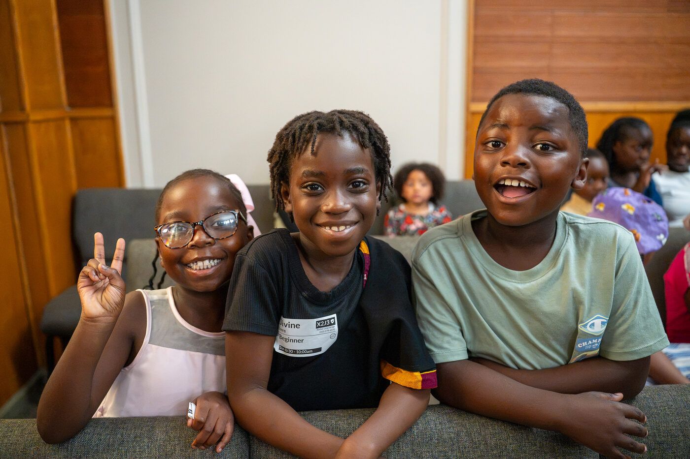 Children smiling during kids ministry at CLA
