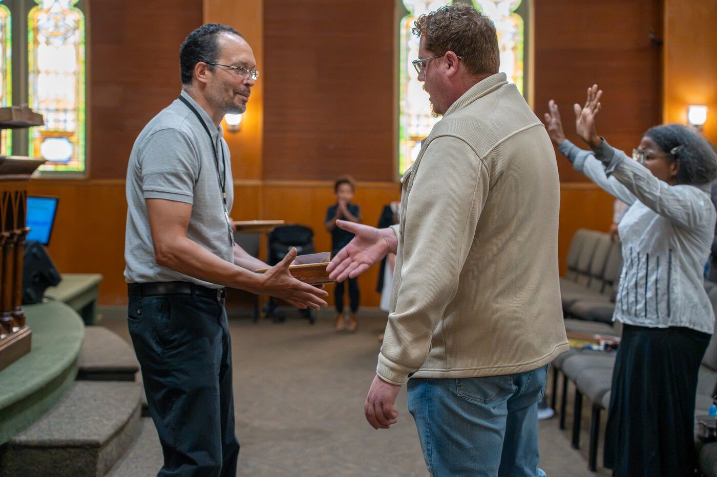 People greeting and connecting at a CLA gathering
