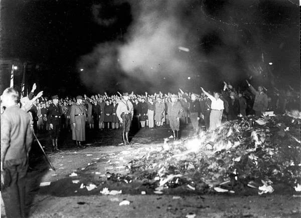 A photo of Nazis burning books