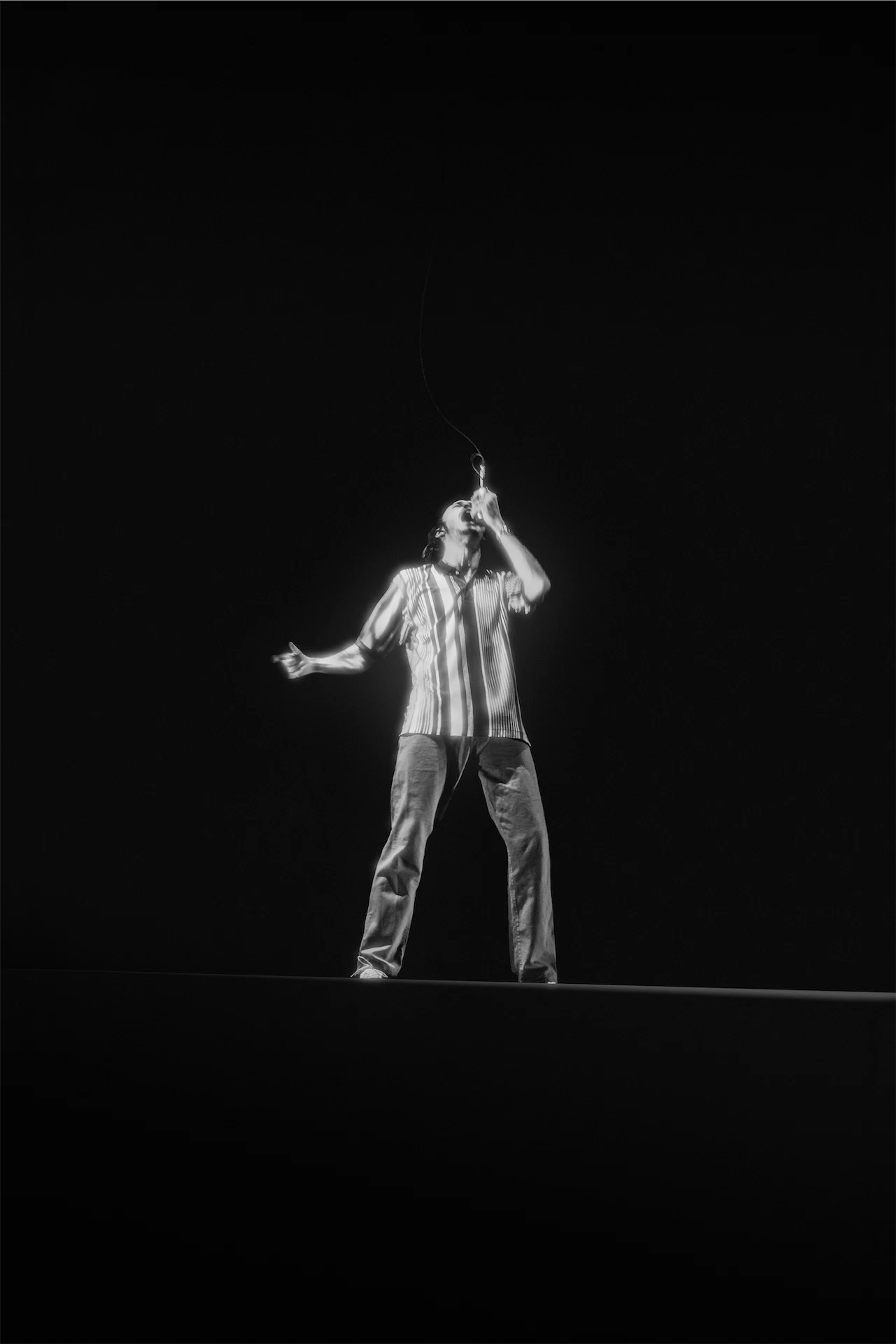 Roméo Elvis on stage Bercy black and white