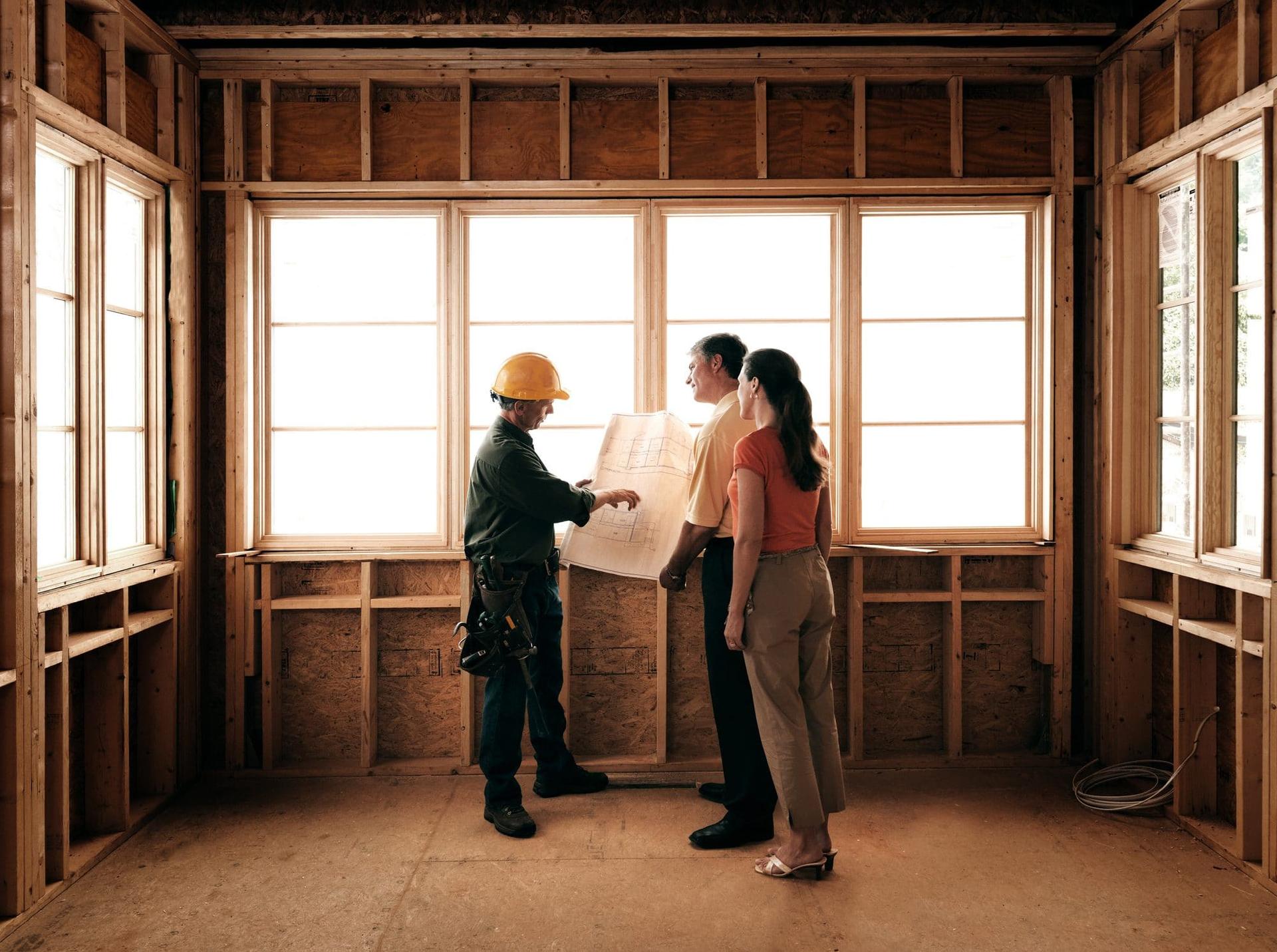 Aspire Grove Homes team walking a finished home interior with buyers in Lynnwood, Washington