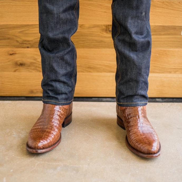 close up picture of Cole Pecan brown cowboy boots on a man's feet