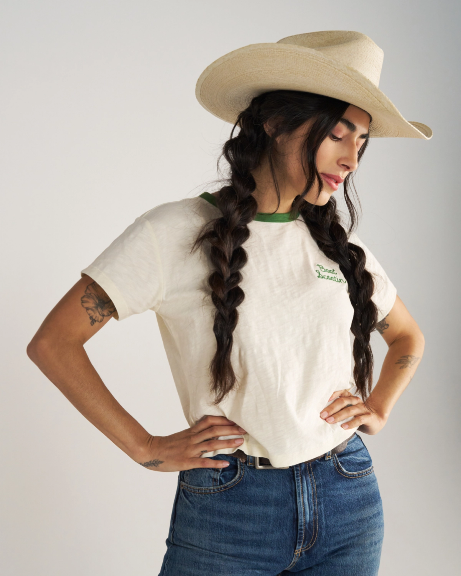 Front view of Women's Vintage Ringer Tee - Bone / Green on model