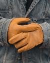 man wearing gloves and jacket