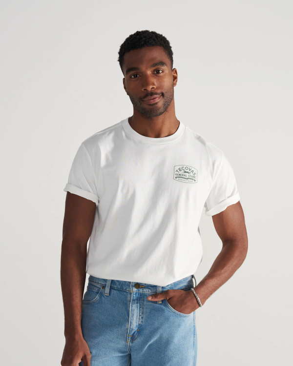 Front view of Men's General Store T-Shirt - Bone/Green on model