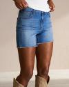 Closeup of woman wearing denim cutoff shorts